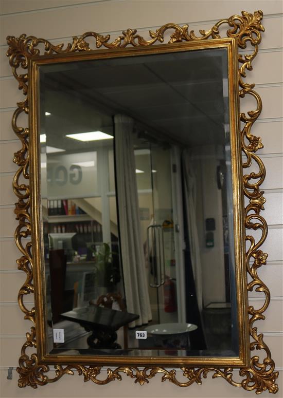 A rectangular carved and pierced wall mirror, H.108cm